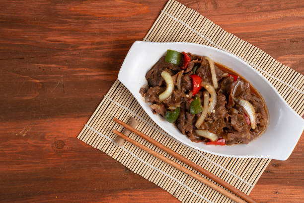 istock Asian Food: Teriyaki Beef with Onions and Peppers. 2204234356