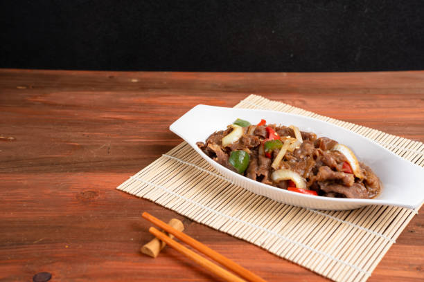 istock Asian Food: Teriyaki Beef with Onions and Peppers. 2204234361