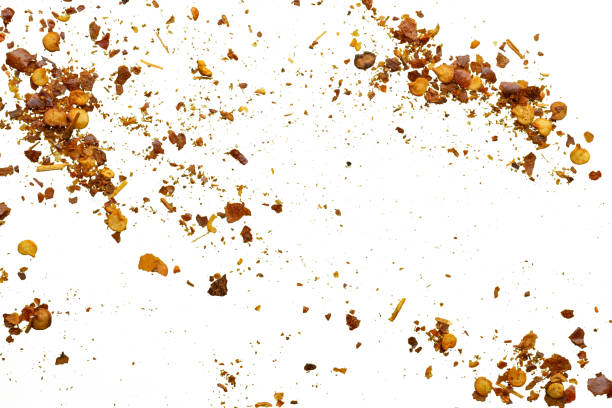 istock dried red chili pepper flakes and seeds isolated on white background 2204236061