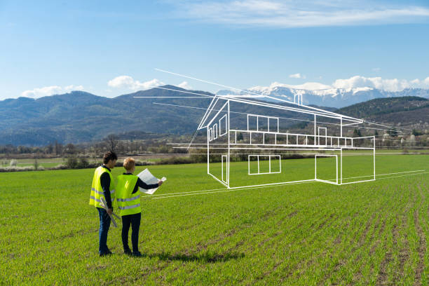istock A couple planning a new house against a moutain backdrop 2204238441
