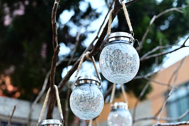 istock Glass Pendant Light Hanging Quietly at Dusk 2204239702