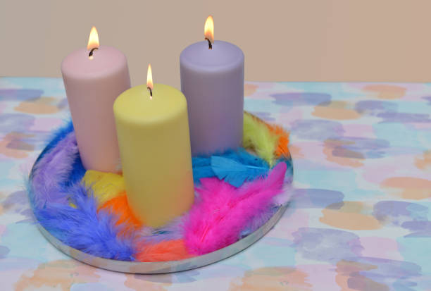 istock Tranquil Candle Arrangement with Soft Feather Accents 2204239995
