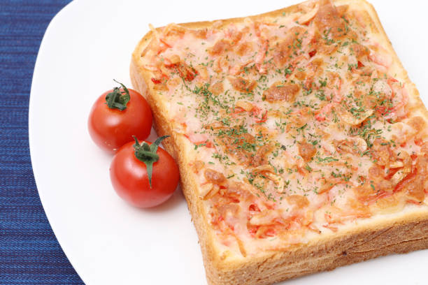 istock sliced toasted bread with cheese, shrimp, parsley 2204240879