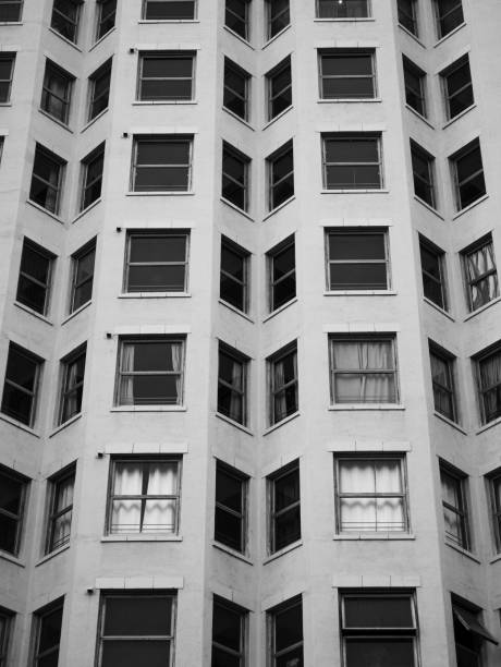 Black and white closeup modern apartment building, Sydney Australia, copy space, full frame horizontal composition