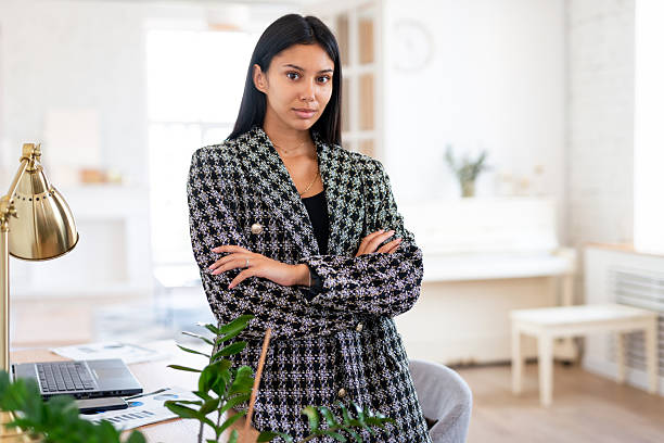 istock Woman Standing in her Home Office 2204253224
