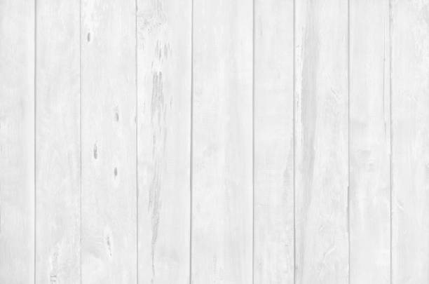 istock White wood planks texture background with vertical natural patterns for design art work and interior or exterior. 2204256286