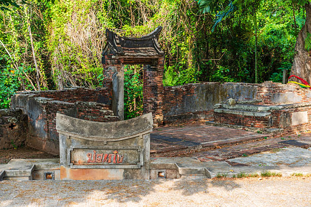 istock Ruins of Borgeng(on Thai language sign) Singhanakhon, Songkhla, Thailand. Ancient brick structures amidst lush greenery, revealing historical architecture and cultural heritage. 2204262979