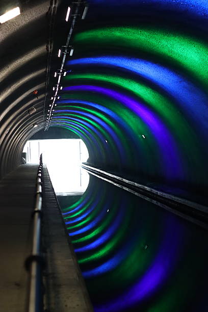 istock Canal tunnel illuminated by colourful lights 2204264065