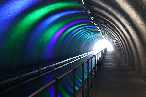 istock Canal tunnel illuminated by colourful lights 2204264089