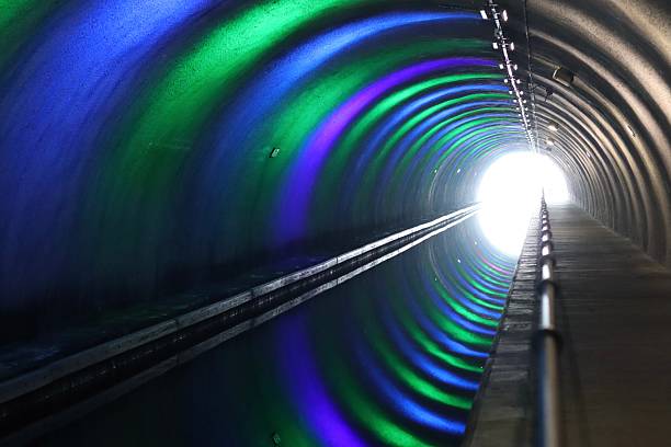 istock Canal tunnel illuminated by colourful lights 2204264240