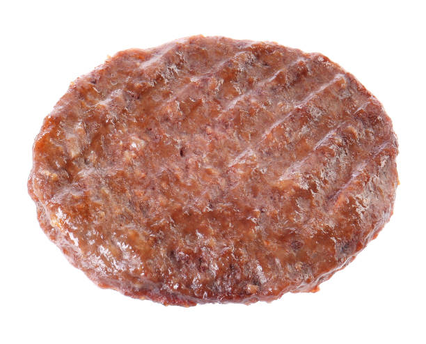 istock Tasty grilled burger patty isolated on white 2204265495
