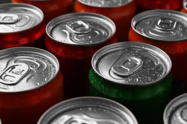 istock Energy drink in wet cans, closeup. Functional beverage 2204267543