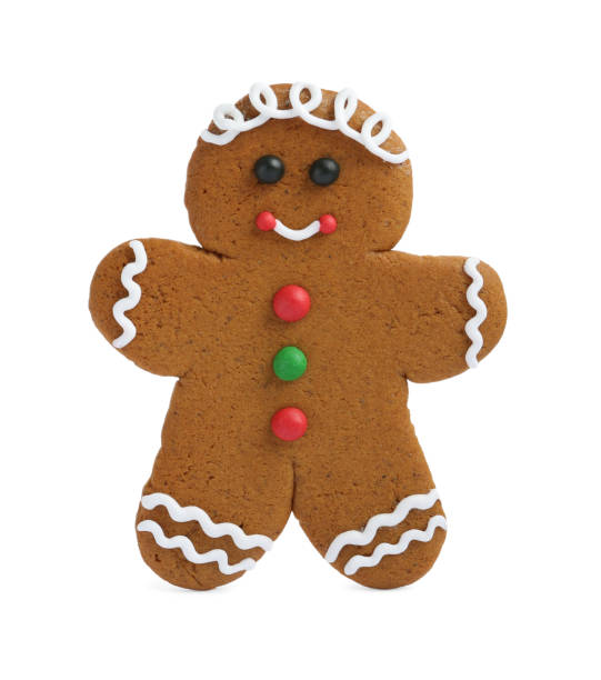 istock Christmas cookie in shape of gingerbread man isolated on white 2204267635