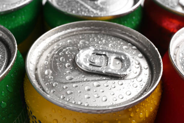 istock Energy drinks in wet cans, closeup. Functional beverage 2204267645