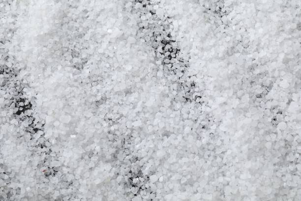 istock White natural salt as background, top view 2204268705