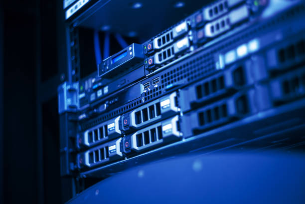 istock Close-Up View of Server Rack with Blue Lighting and Technology Details 2204270160