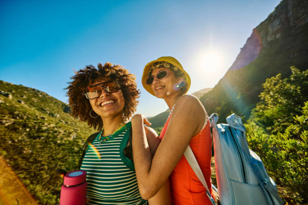 Tourists enjoying the sunset in the mountain