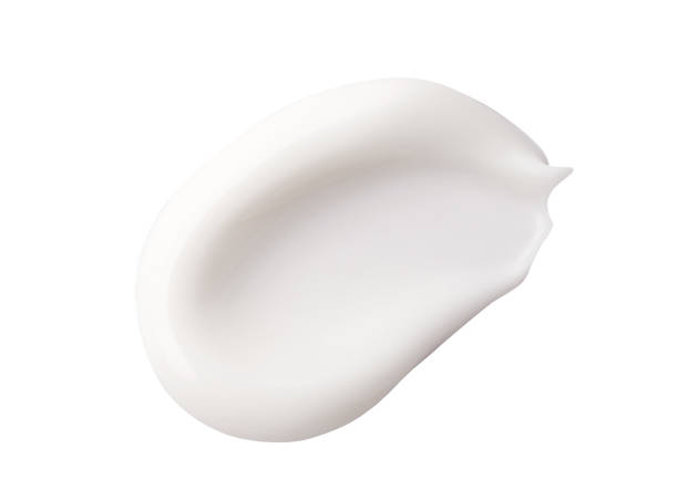 istock cosmetic sample smear of cream on white background 2204276631