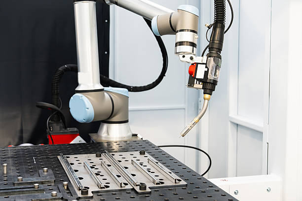 istock Automatic welding robot in a modern factory in operation. 2204279283