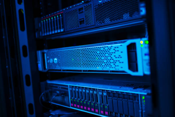 istock Close-Up View of Rack-Mounted Servers in Data Center Lighting Setup 2204281264
