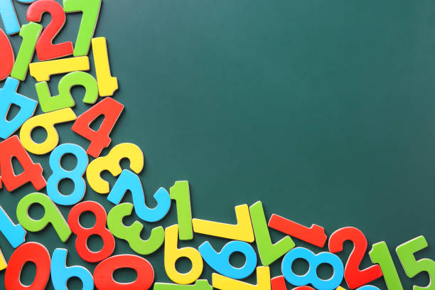 istock Colorful numbers on green background, flat lay. Space for text 2204287856
