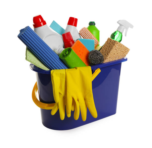 istock Different cleaning products in bucket isolated on white 2204287963