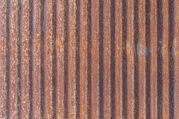 rusty weathered metal sheet with vertical corrosion patterns, highligh the rough texture, oxidation process, natural color variations, perfect for industrial, grunge, vintage, abstract backgrounds