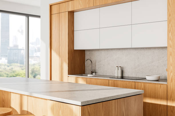 istock Modern kitchen interior with wooden cabinets and minimalist design. 3D Rendering 2204290291