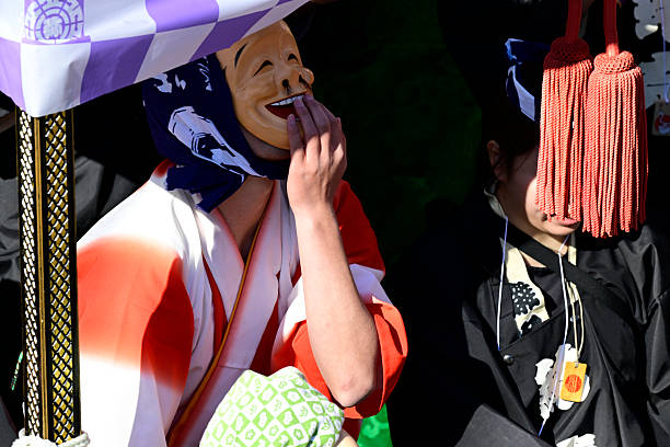 Man with face mark at the National Foundation Day Celebration Parade on February 11 to commemorate the founding of Japan  and the ascension of Emperor Jimmu to the throne in 660 B.C, Tokyo, Japan.