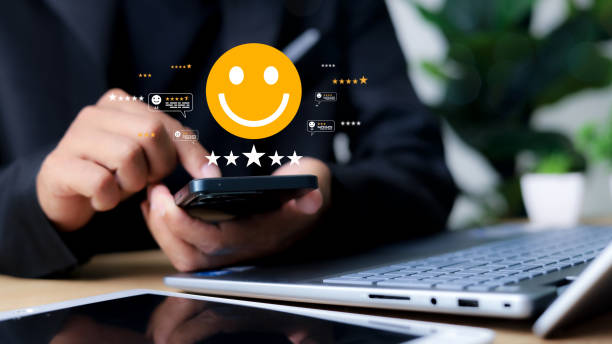 istock Online customer satisfaction Survey service concept. Satisfaction survey, customers use smartphones to rate their experience with five stars. 2204299685