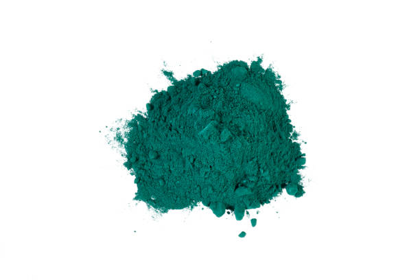 istock dark green powder pile isolated on white 2204301276