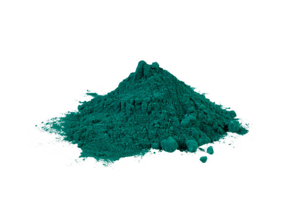 istock dark green powder pile isolated on white 2204301282