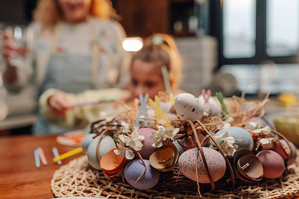 istock Easter eggs decoration with children painting in the background 2204305981
