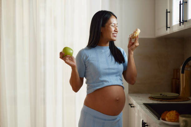 istock Healthy vs. unhealthy snack in pregnancy! 2204306636