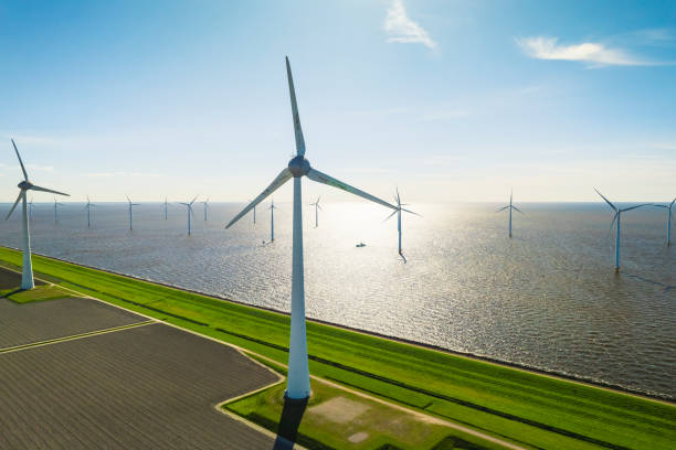 istock Wind turbines in lakeshore wind park producing electricity during 2204306893