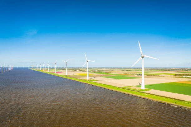istock Wind turbines in lakeshore wind park producing electricity during 2204306973