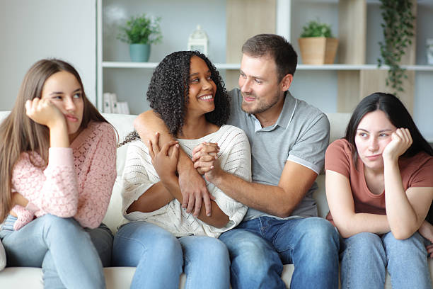 istock Diverse couple flirting and their friends boring 2204312628