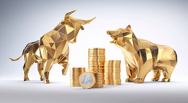 istock Isolated golden bull and bear with stack of Euro coins 2204312993