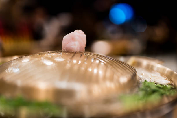 istock Cubes lard meats put on a hot brass for Thai Moo Krata coated 2204315301