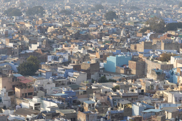 istock crowded blue city view from mountain top at morning 2204321173