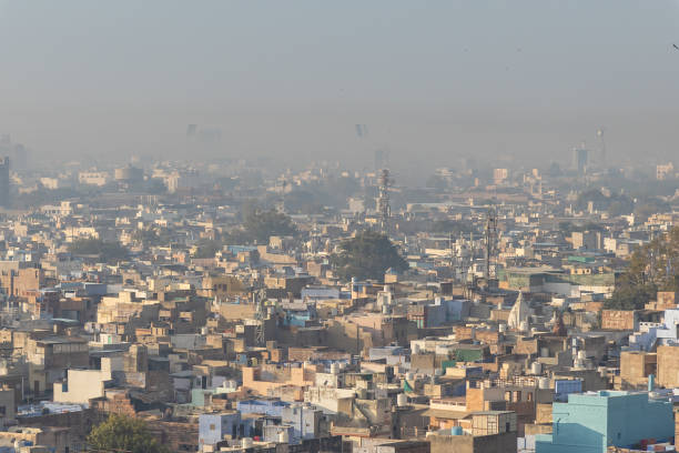 istock crowded misty city view from mountain top at morning 2204321181