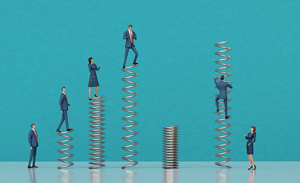 istock Businessman jumping on springs, running towards the highest point. 3D rendering 2204324745