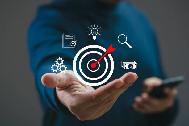 istock A focused person targets goals with precision, symbolizing ambition and strategy for success in a competitive environment, blending technology and innovation. 2204333991