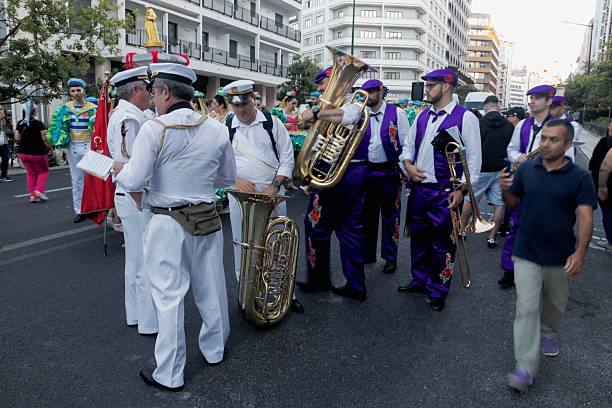 Lisbon, Portugal - June 12, 2024: Band musicians dressed in traditioanl folklore cosutmes prepare to parade in Lisbon downtown during this city celebrations of the Popular Saints.
