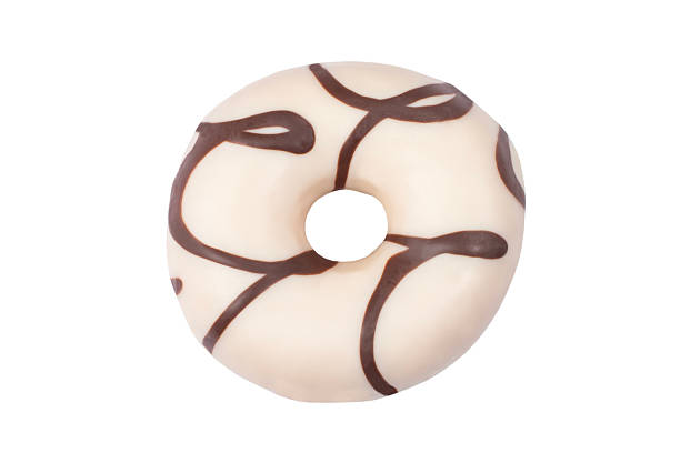 istock Donut covered with white chocolate glaze with dark chocolate swirls isolated on white background, sweet confectionery pastry 2204341005