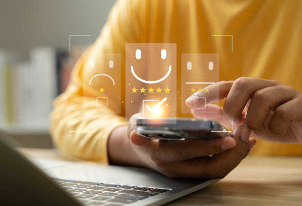 istock Online customer satisfaction survey, Client giving Five-Star feedback and reviews for quality service on application. Experience, Evaluating service quality, Business reputation and ranking concept. 2204345506