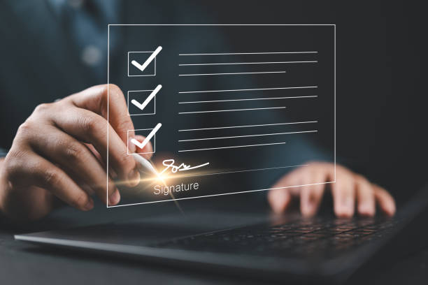 istock Signing electronic documents on digital documents Online, businessman with contract Electronic signature, e-signing, digital document management, paperless office, signing business contract concept, 2204348897