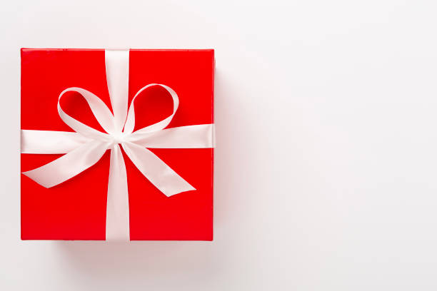 istock Open red gift box on color background, top view 2204352730