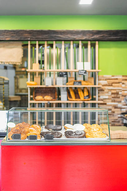 istock Delicious pastries displayed in modern bakery showcase 2204354553