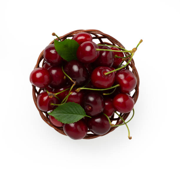 istock Basket with ripe cherries isolated on white 2204355138